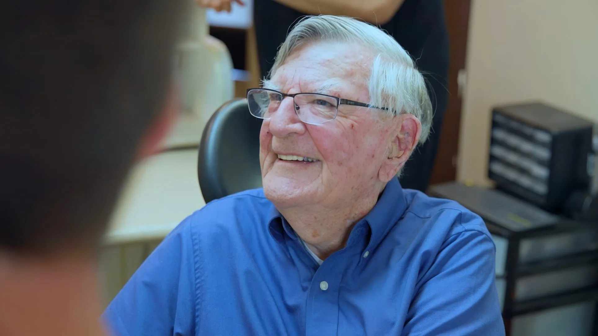 An older patient smiling during a visit at Cardinal Point Dental during a visit for gum disease treatment in Jacksonville, FL